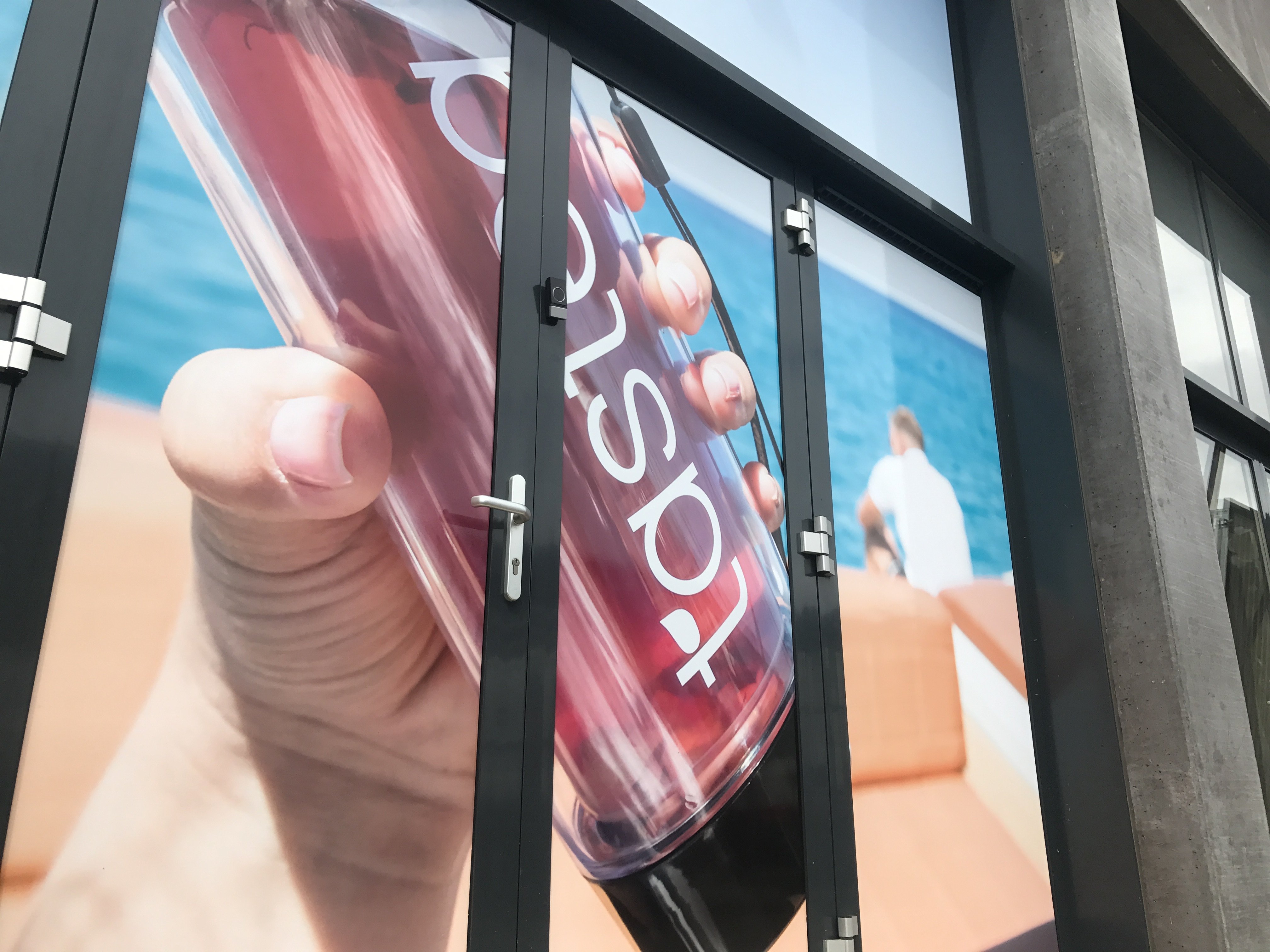 Full color raambelettering bedrijfspand Sittard